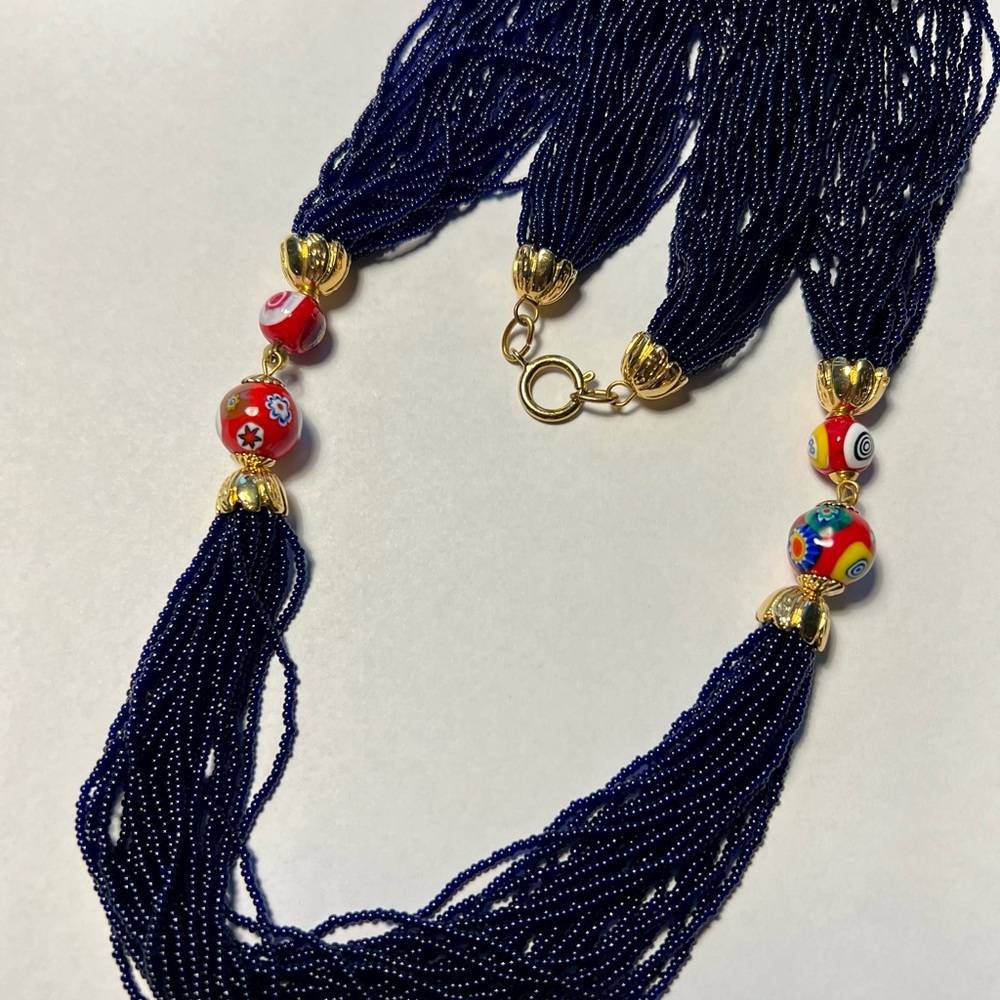 Vintage blue seed beads necklace with Murano-like enhancer.
